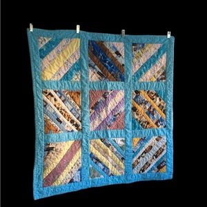 Homemade baby quilt, machine stitched mostly blue